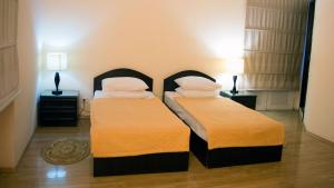 Postel nebo postele na pokoji v ubytování Imereti Health Resort