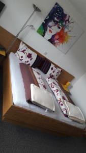 Łóżko lub łóżka w pokoju w obiekcie Gasthof Hirschen