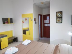 Postel nebo postele na pokoji v ubytování L Anfora