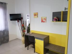 TV a/nebo společenská místnost v ubytování L Anfora
