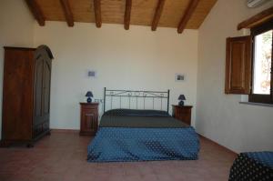 A bed or beds in a room at Villa Rica