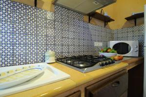 Kuchyň nebo kuchyňský kout v ubytování Residence Casa Torretta