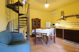 Kuchyň nebo kuchyňský kout v ubytování Residence Casa Torretta