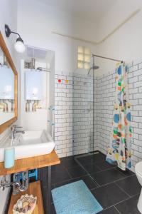 a bathroom with a sink and a shower at New - Super Nice Super Central in Budapest