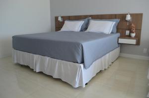 Postel nebo postele na pokoji v ubytování Itacolomi Hotel
