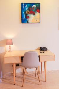 TV a/nebo společenská místnost v ubytování Hotel Cote ocean Mogador