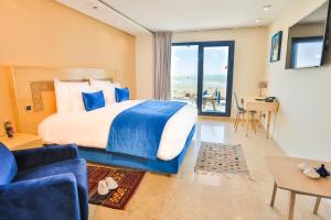 Postel nebo postele na pokoji v ubytování Hotel Cote ocean Mogador