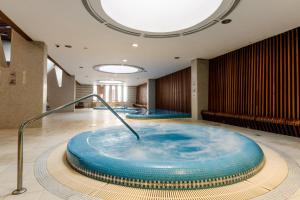 a jacuzzi tub in a room at Sweet Home at the Danube with wellness in Budapest