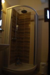 Koupelna v ubytování Hotel Achillion