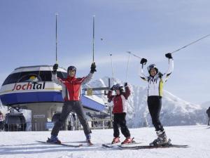 a group of three people on skis in the snow at Plonerhof - Ferienhaus Maria in Rodengo