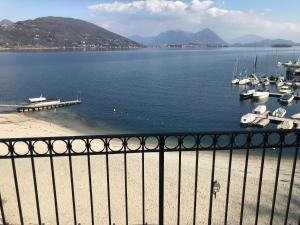 a view of a marina with boats in the water at Appartamento il Porto in Baveno