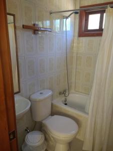 Ванная комната в Cabañas Tornagaleones Villarrica