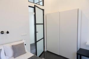 Posteľ alebo postele v izbe v ubytovaní Art Room Boutique Apartment