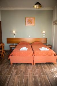 Katil atau katil-katil dalam bilik di Togias Hotel