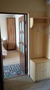 an open door to a room with a room with a door at Sunshine View in Cluj-Napoca