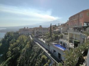 an aerial view of a city with buildings at Casa Diana in Giardini Naxos