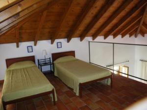 A bed or beds in a room at Cohili Villa