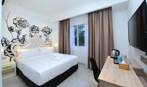 Postel nebo postele na pokoji v ubytování Hotel de Art USJ 21