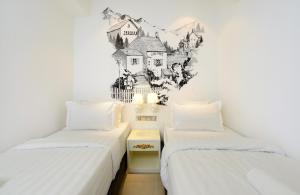 Postel nebo postele na pokoji v ubytování Hotel de Art USJ 21 + 28 fotografií