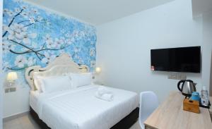Postel nebo postele na pokoji v ubytování Hotel de Art USJ 21