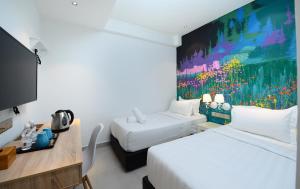 Postel nebo postele na pokoji v ubytování Hotel de Art USJ 21