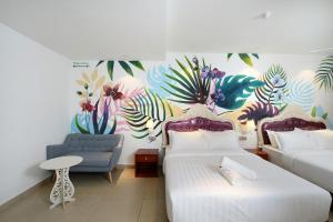 Postel nebo postele na pokoji v ubytování Hotel de Art USJ 21