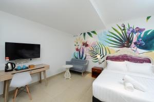 TV a/nebo společenská místnost v ubytování Hotel de Art USJ 21