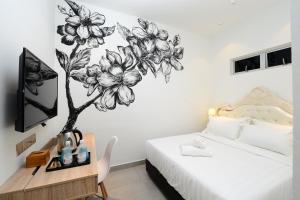 Postel nebo postele na pokoji v ubytování Hotel de Art USJ 21