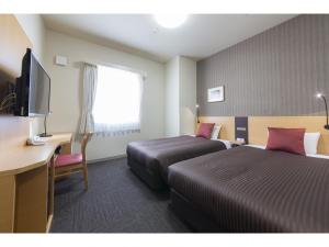 TV a/nebo společenská místnost v ubytování Hotel Super Tomari