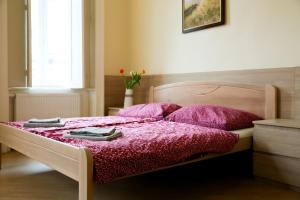 Posteľ alebo postele v izbe v ubytovaní East Private Rooms