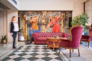 Χώρος καθιστικού στο Jolly Hotel 