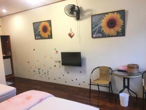Ліжко або ліжка в номері Chin Shan B&B