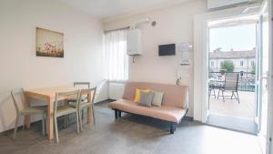 Χώρος καθιστικού στο Fiori sull'Acqua Apartments