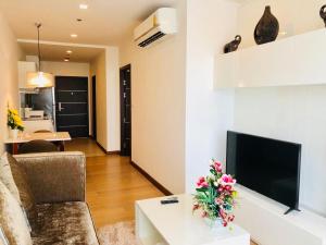 TV a/nebo společenská místnost v ubytování Astra Suites Central