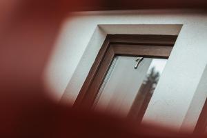a close up of a door with a window at Panoramic Apartments - MontePalazzo Sinaia in Sinaia