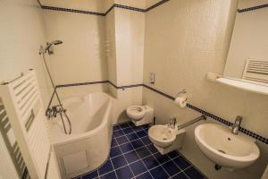 Kúpeľňa v ubytovaní National Theater Ruterra Flat + 13 fotografií