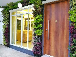 Zahrada ubytování DC Suites Aeropuerto