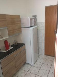 Ett kök eller pentry på Excelente apartamento em Belo Horizonte