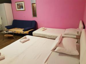 Posteľ alebo postele v izbe v ubytovaní Vila Angela + 37 fotografií