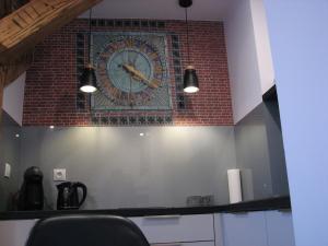 Kuchyňa alebo kuchynka v ubytovaní Apartamenty "BULWAR GORZOW"