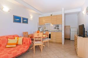 Kuchyň nebo kuchyňský kout v ubytování Apartmani Dorita