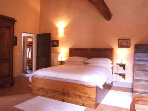 Säng eller sängar i ett rum på Villa Granchiaia