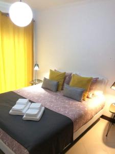 Cama o camas de una habitación en Indigo Suite Apartments