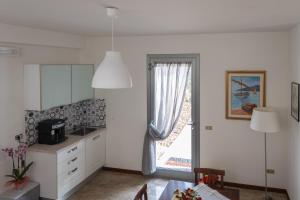 Kuchyň nebo kuchyňský kout v ubytování Ellebì B&B + 32 fotografií