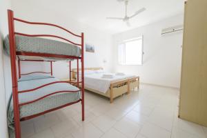 Postel nebo postele na pokoji v ubytování Albergo Marla