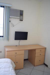 TV a/nebo společenská místnost v ubytování Alojamiento Castelnouvo, Entre Ríos, Guayaquil, Ecuador