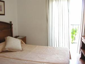 Postel nebo postele na pokoji v ubytování Hostal Soledao