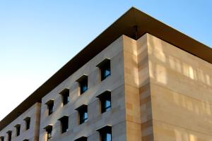a building with windows on the side of it at New Hotel of Marseille - Vieux Port in Marseille