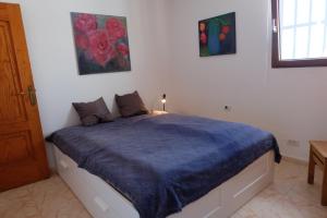 Ένα ή περισσότερα κρεβάτια σε δωμάτιο στο Chalet Lobo +9 φωτογραφίες