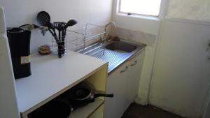 A cozinha ou cozinha compacta de Apartamento Valparaiso